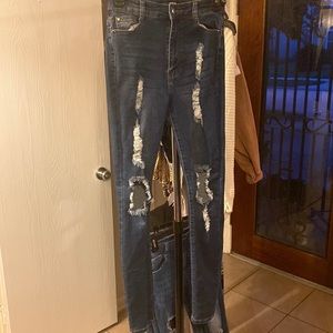 High waist ripped dark blue jeans